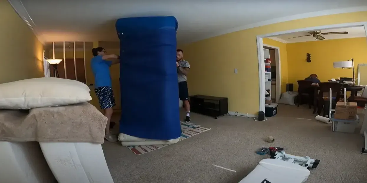 Professional movers carrying boxes